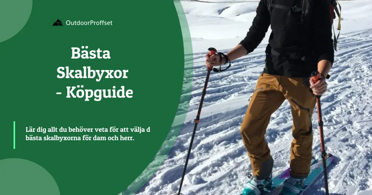 Toppturåkare i senapsgula skalbyxor med stavar i handen