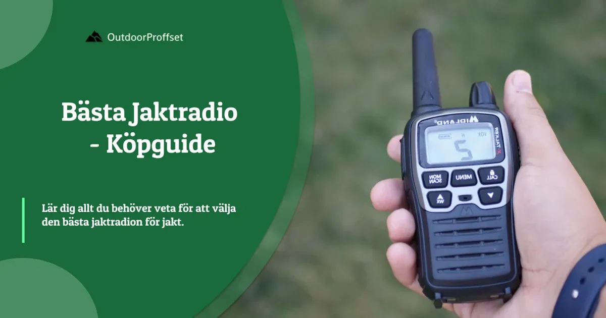 Hand håller svart Midland-radio utomhus