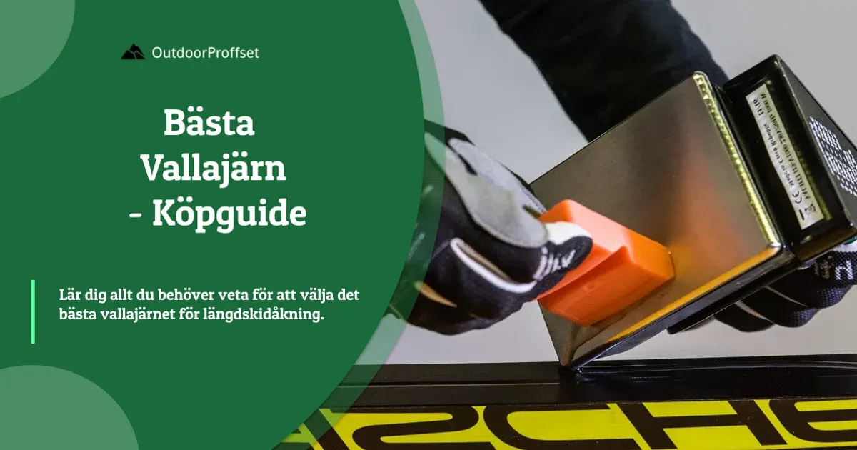 Hand i handske stryker orange vallajärn över skida